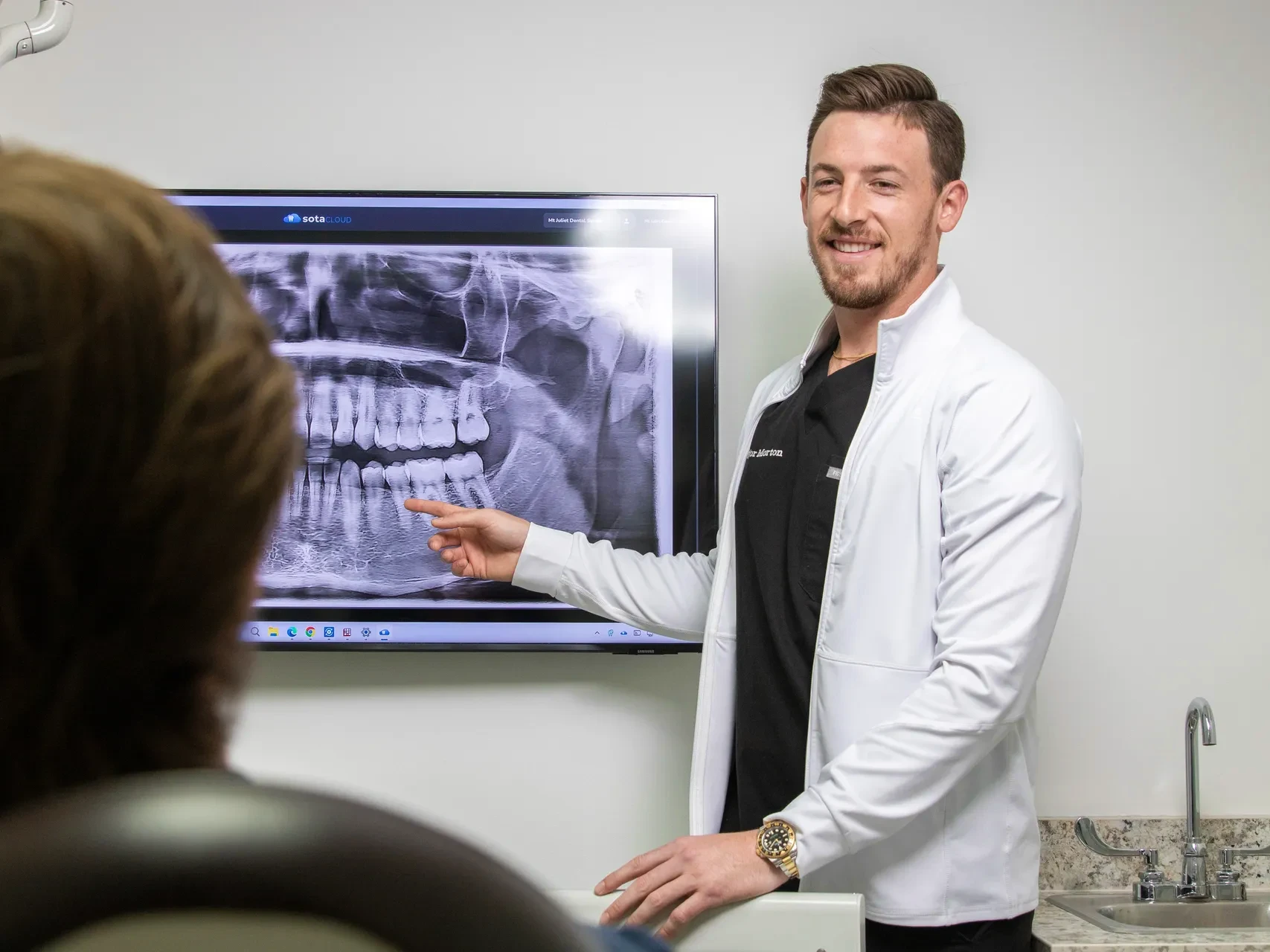 Dr. Morton with a patient who came in for a tooth extraction in Mt Juliet, TN